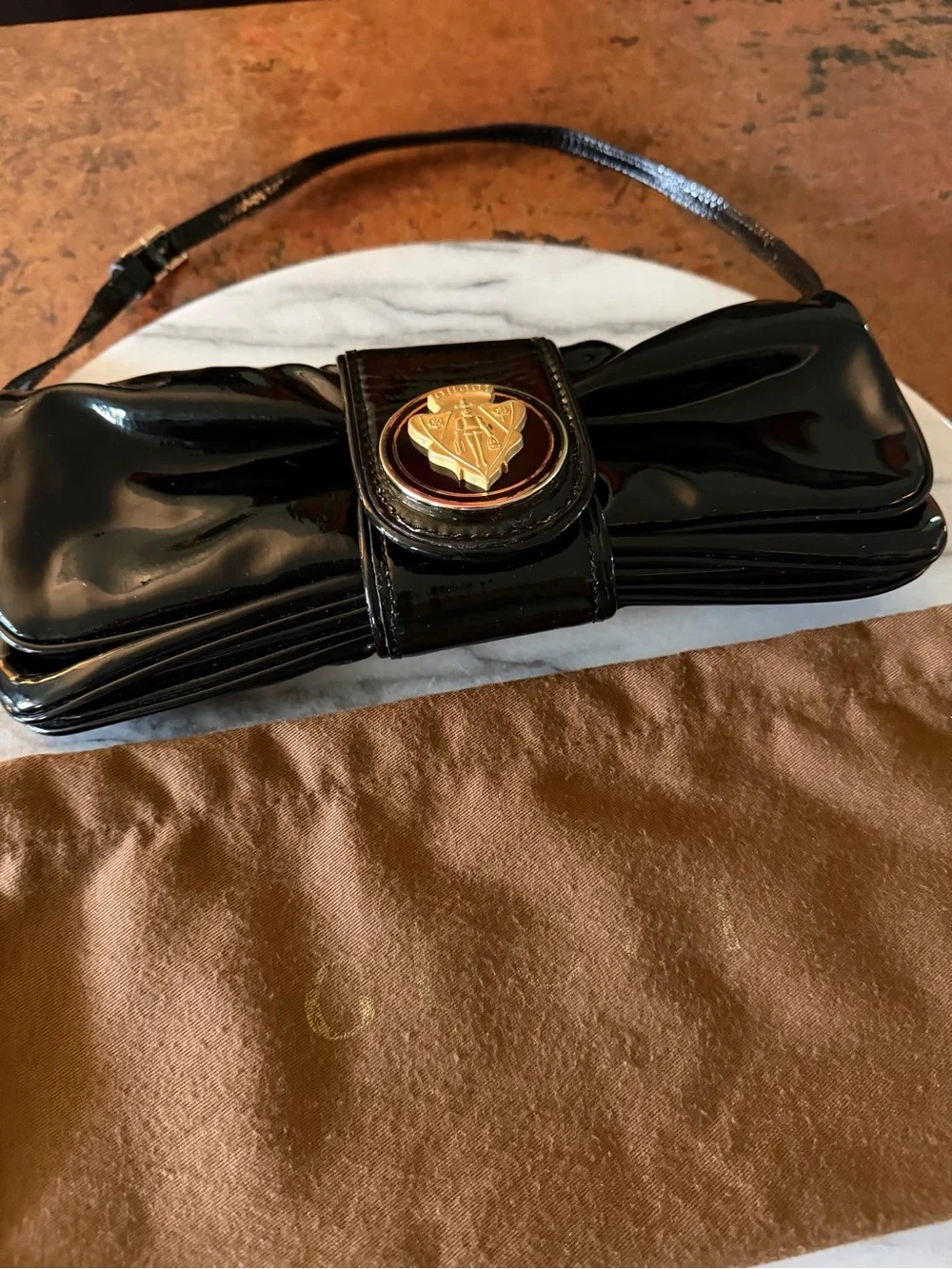 Vintage Gucci Black Patent Leather Clutch with Gold Crest